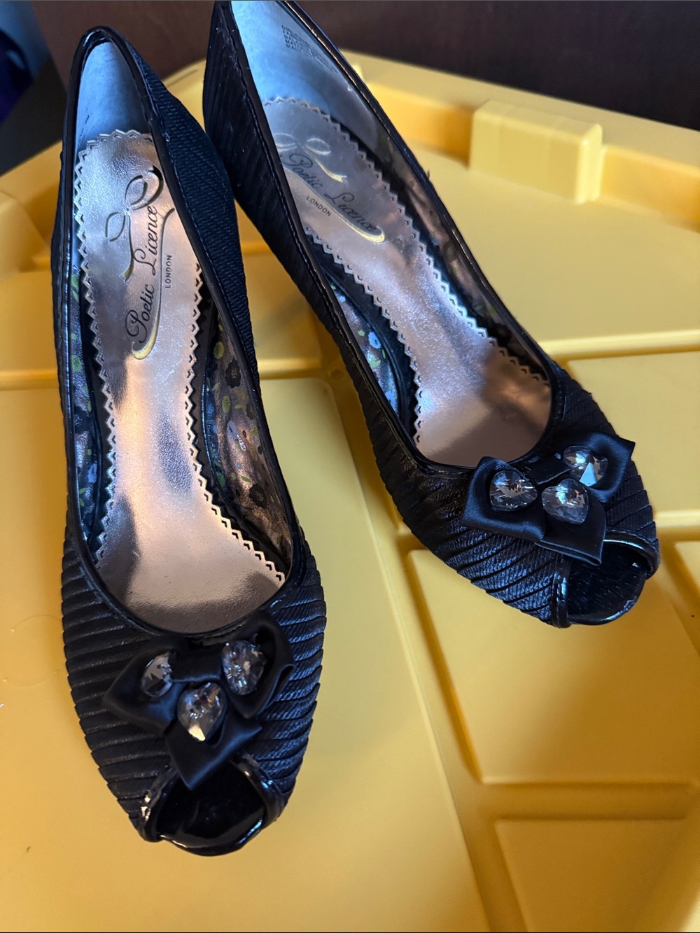 Poetic License Black Satin Peep-Toe Heels with Crystal Bow